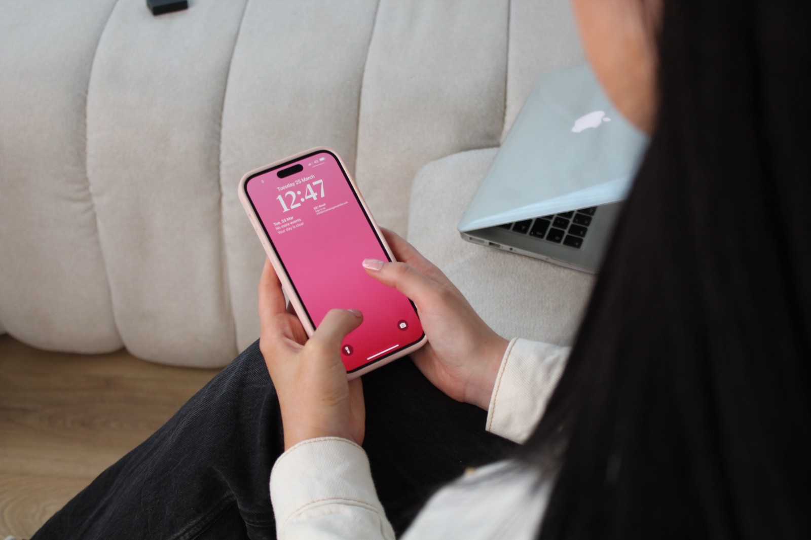 Jessica planning tasks on her phone
